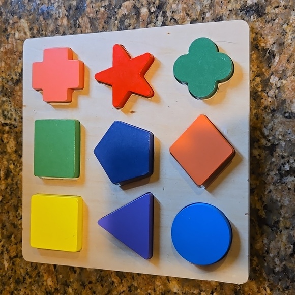 Wooden shapes puzzle. - Picture 1 of 4